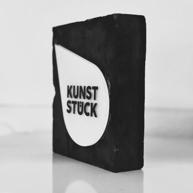 Logoaufsteller Kunststück